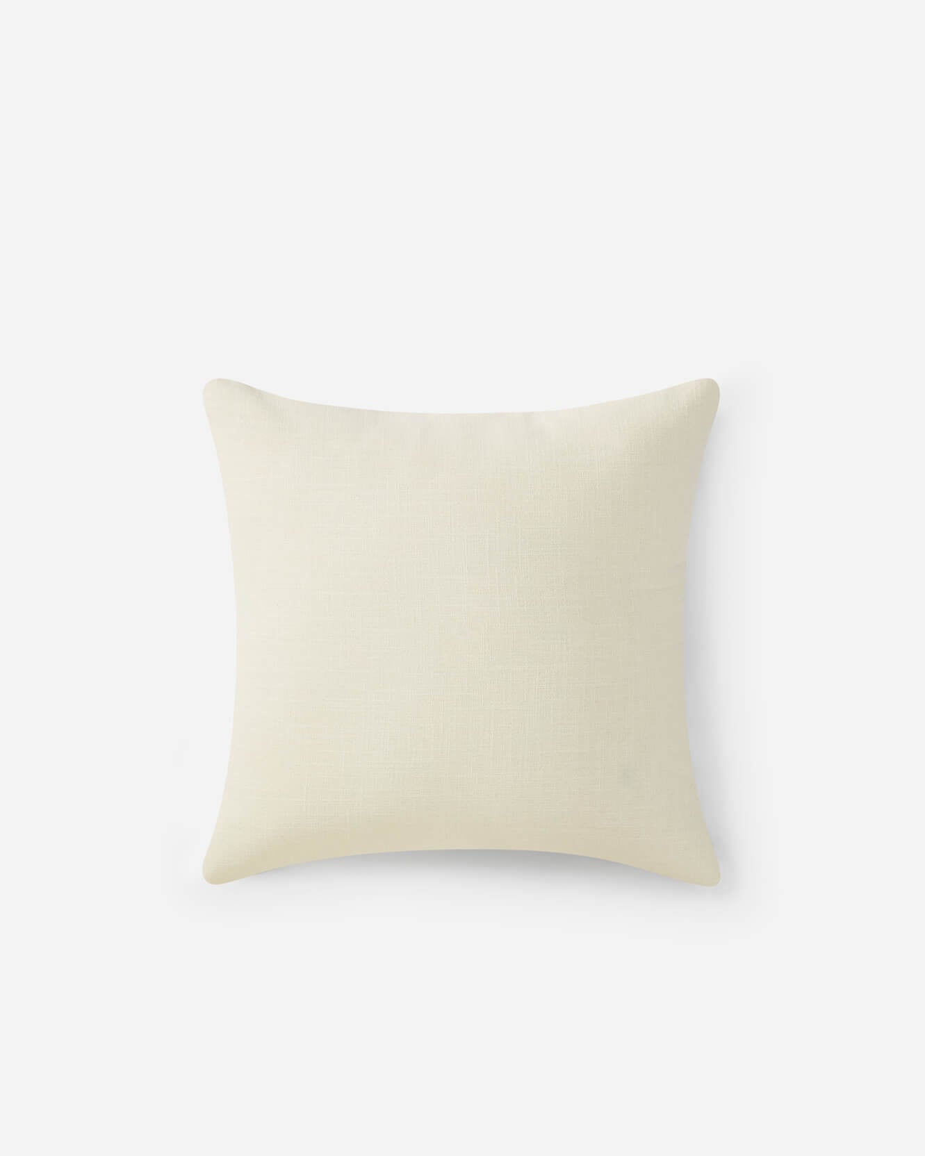 Reverse side of palm leaf embroidered throw pillow navy off white variant showing plain off white linen back on grey background