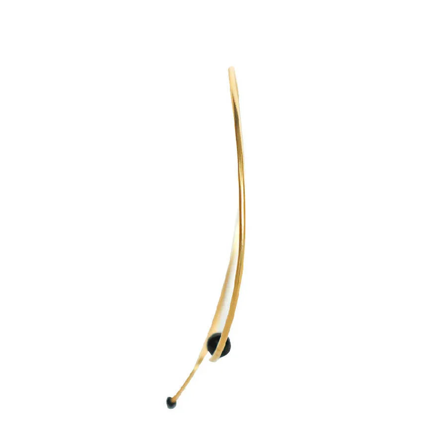 Swara Necklace by Dotto Objects featuring gold-washed brass curves and black stone beads.