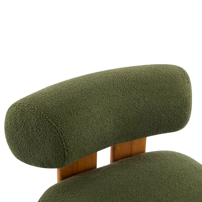 Close-up of olive green textured fabric chair backrest with wooden support, modern home furniture