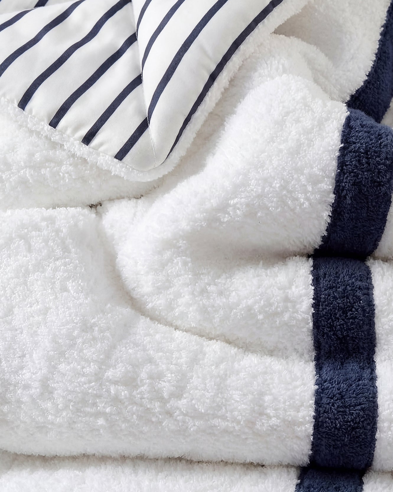Amarena Snug Striped Comforter close detail of navy stripe pattern on soft breathable cotton 