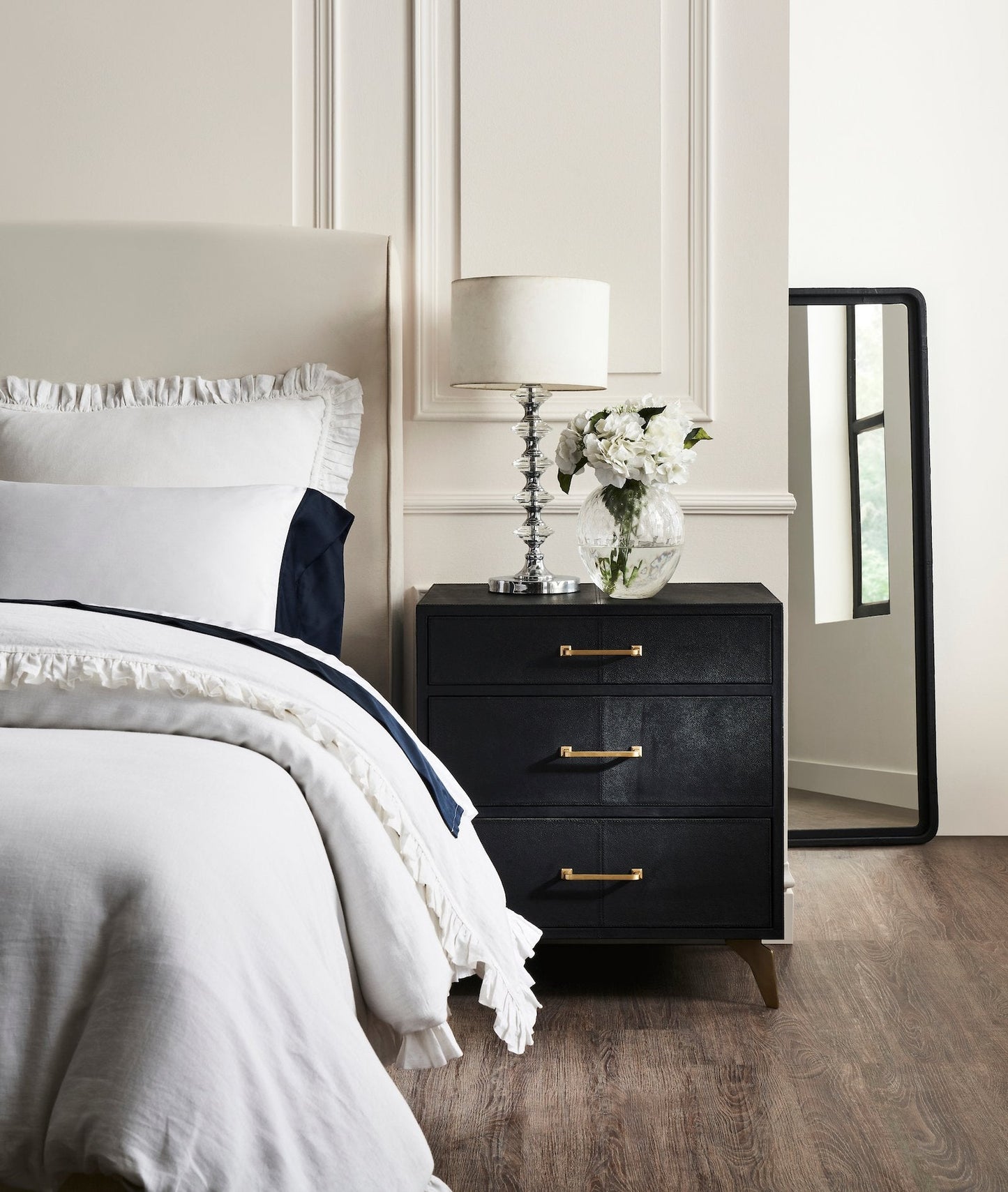 Berkeley Leather Nightstand black bedroom lifestyle white bedding chrome lamp floor mirror 