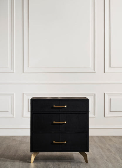 Berkeley Leather Nightstand black three drawer full view brass legs white paneled wall 