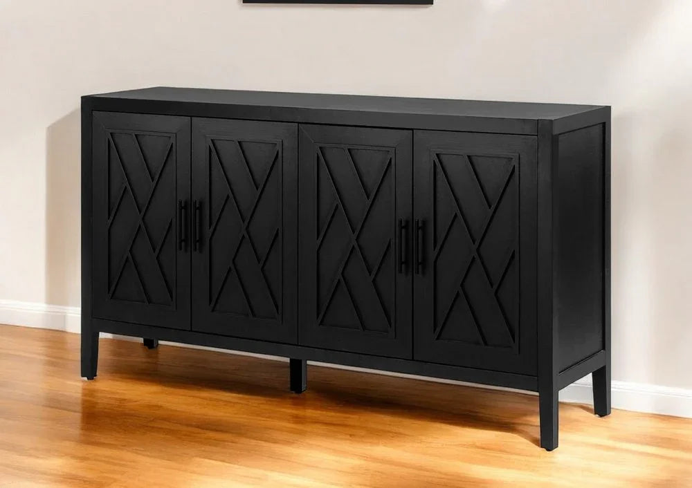 A lifestyle view of the Black Distressed Sideboard Cabinet with geometric doors, positioned on a light wood floor in a modern room.