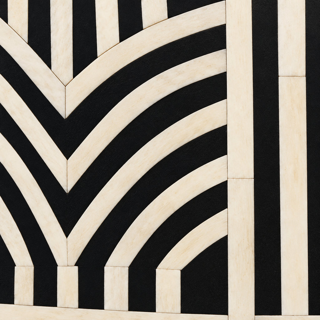 Extreme close-up of hand-cut bone inlay strips forming the chevron pattern on the Edessa bone inlay coffee table