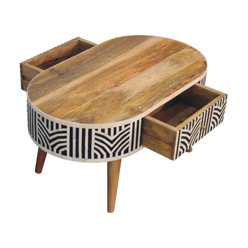 Oval bone inlay coffee table with both storage drawers open showing the natural mango wood interior and chevron inlay drawer fronts