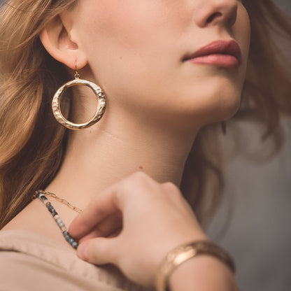 Infinity Earrings Powered by People
