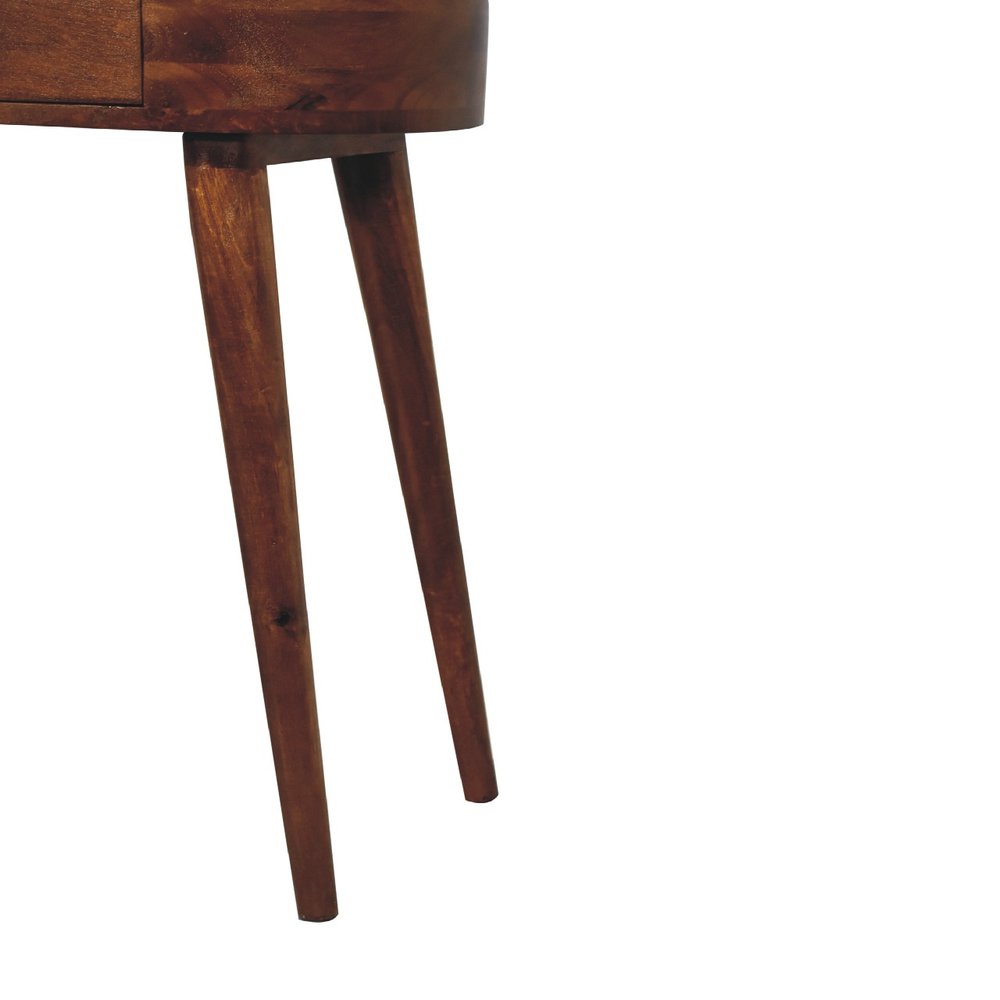 Close-up of chestnut solid wood console table showing tapered splayed leg construction and natural mango wood grain on white background