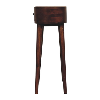Chestnut oval solid wood console table showing slim side profile with splayed legs and drawer pull on white background