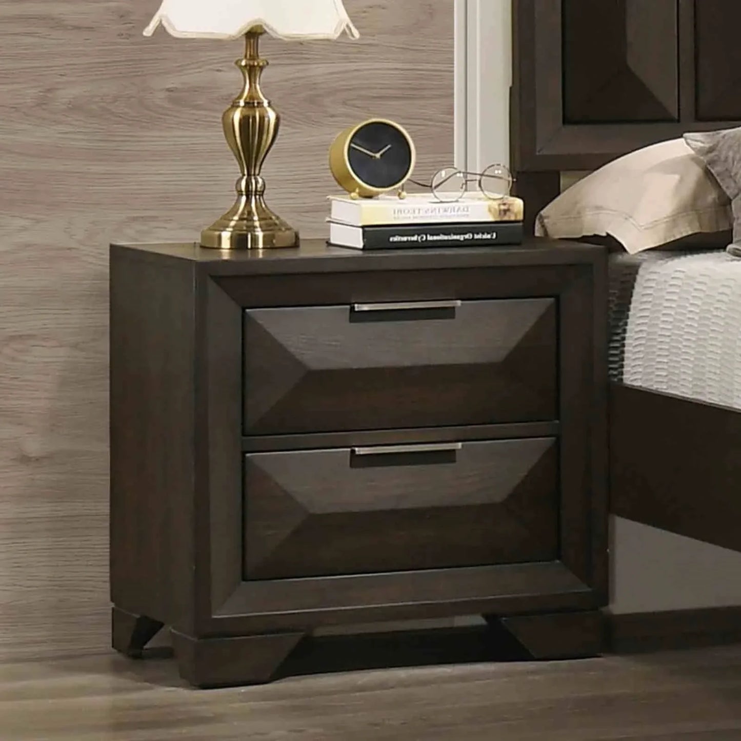 Close-up of a two-drawer espresso nightstand featuring architectural faceted panels and sleek horizontal hardware.