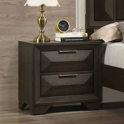 Close-up of a two-drawer espresso nightstand featuring architectural faceted panels and sleek horizontal hardware.
