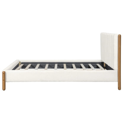 White bouclé queen bed frame side profile view showing panel headboard slat system depth and six inch rubberwood legs on white studio background

