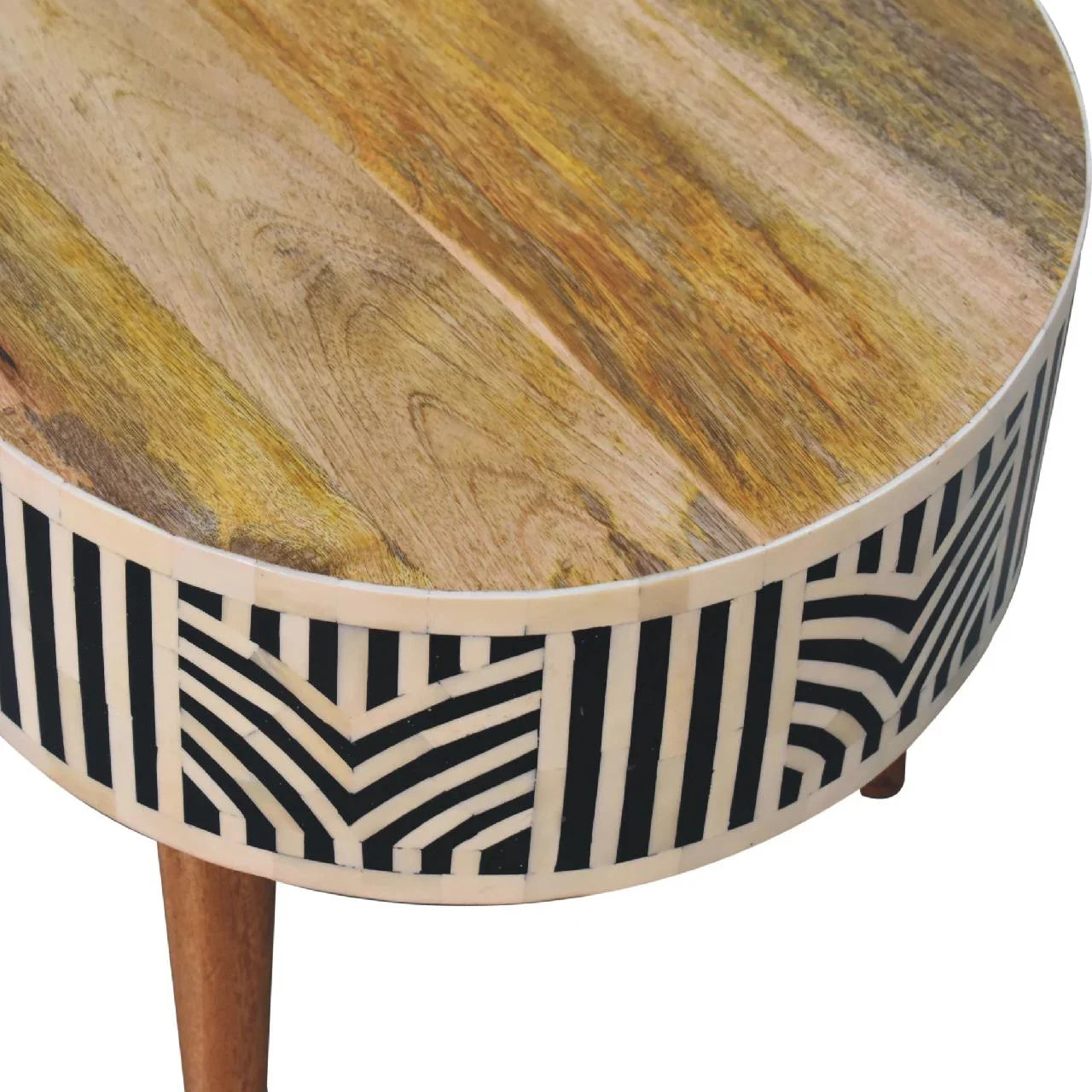 Edessa bone inlay coffee table close-up of solid mango wood tabletop grain and geometric black and white bone inlay drawer wrap with tapered leg detail

