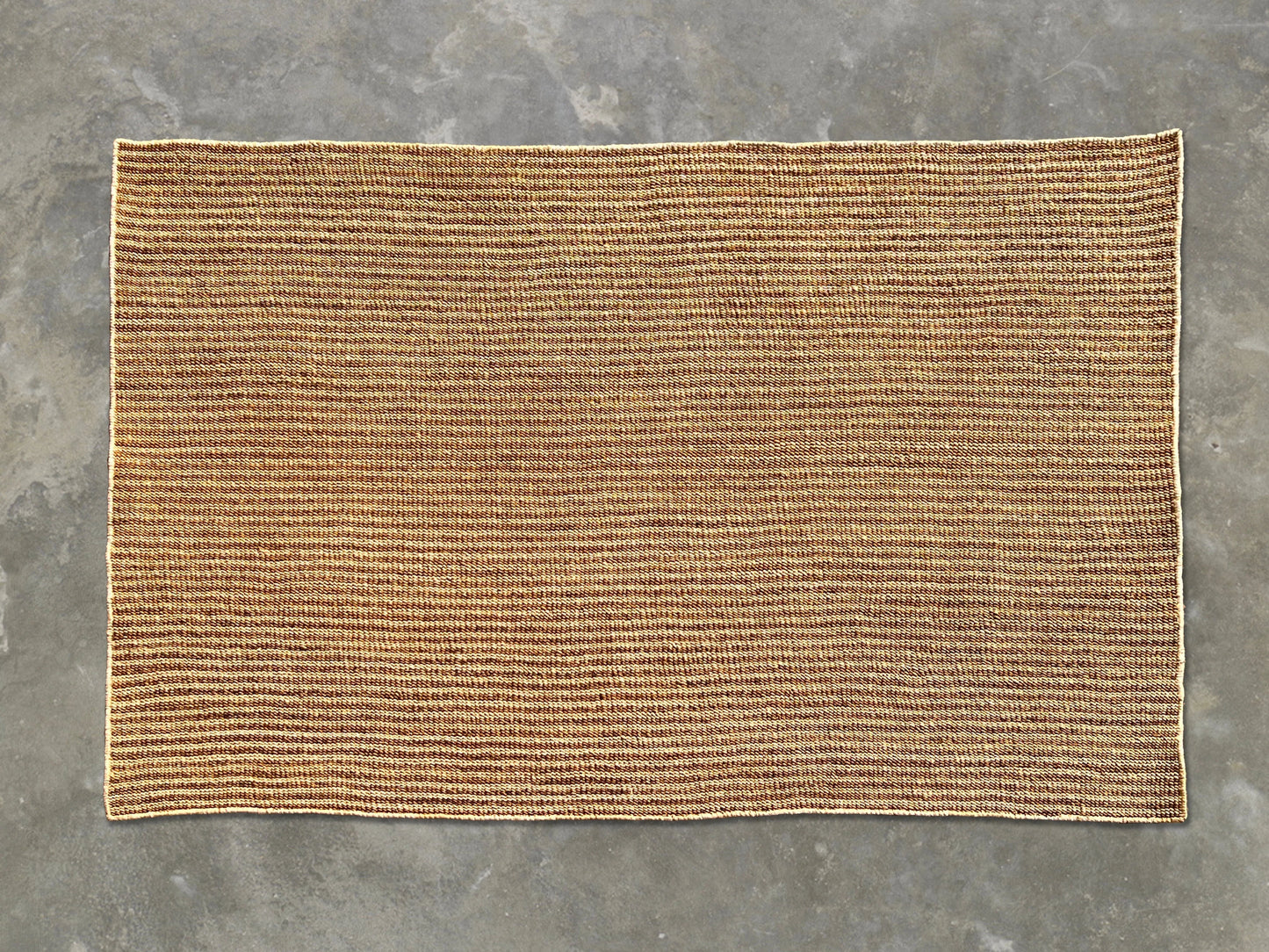 Full flat lay of handwoven rectangular sisal rug tea variant showing golden amber russet weave cream binding and full dimensions