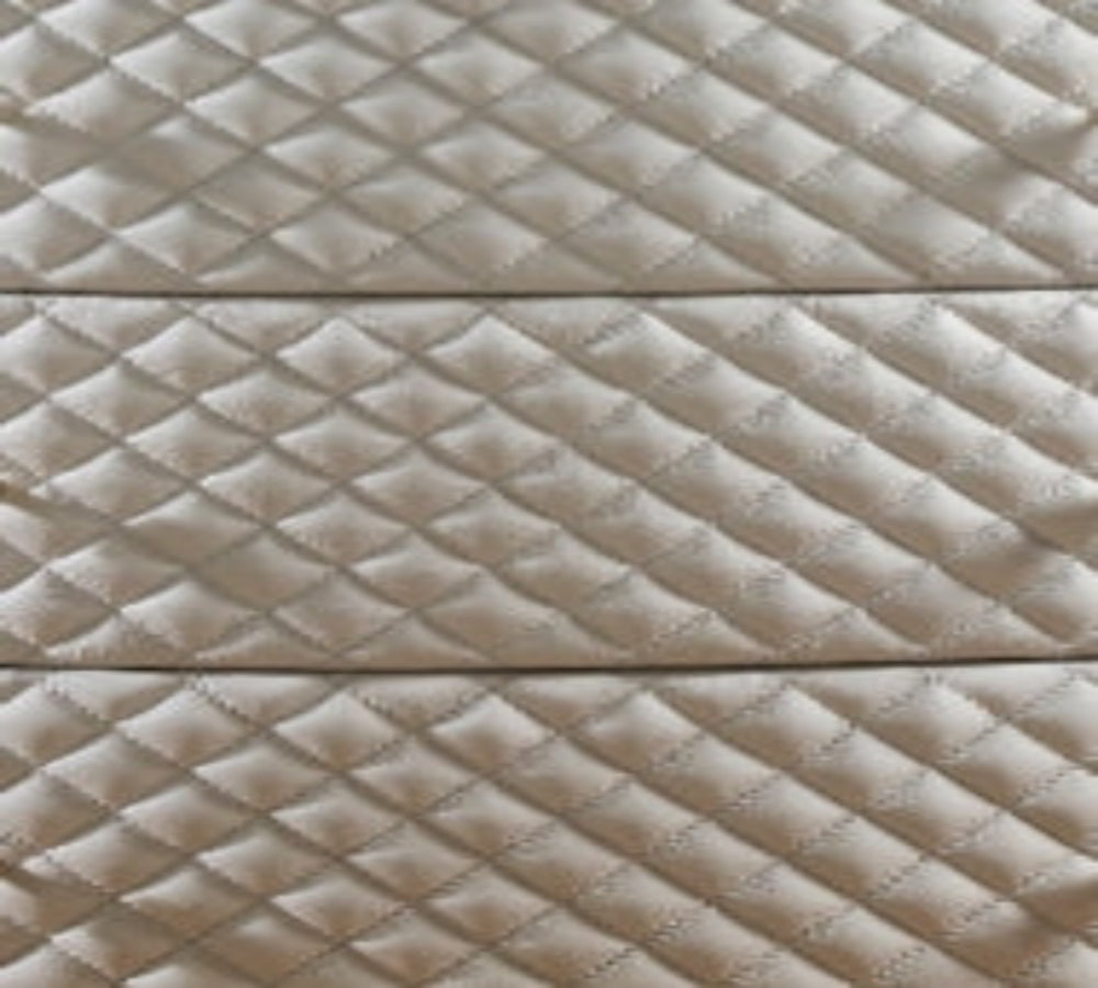 Harvard Quilted Three-Drawer Leather Chest white genuine leather diamond quilting texture detail extreme close-up three drawer fronts