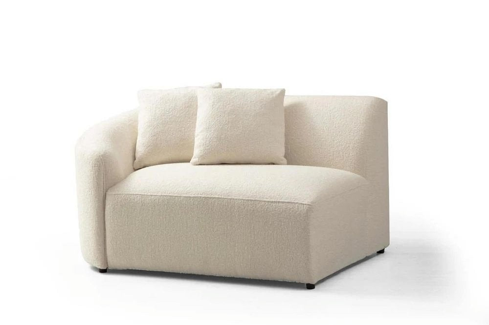Ivory boucle modular sofa seat section with recessed arms, two toss pillows, and clean curved frame on a white background