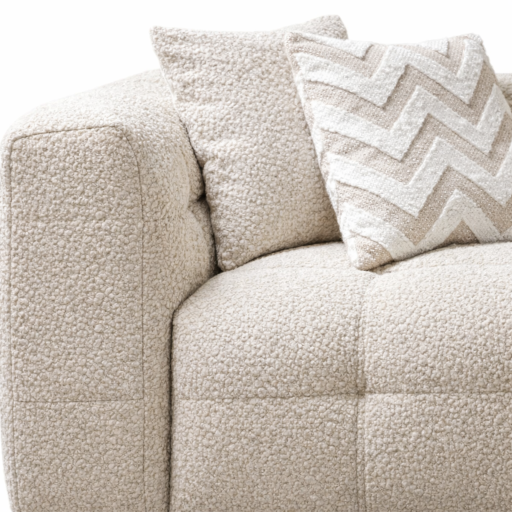 Ivory Boucle Sectional Sofa Arm and Back Detail Showing Channel Tufted Stitching and Included Chevron Accent Pillow Close-Up | Fluent Trends