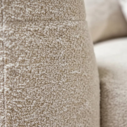 Ivory Boucle Sectional Sofa Close-Up Showing Loopy Textured Polyester Boucle Fabric Detail and Arm Edge | Fluent Trends