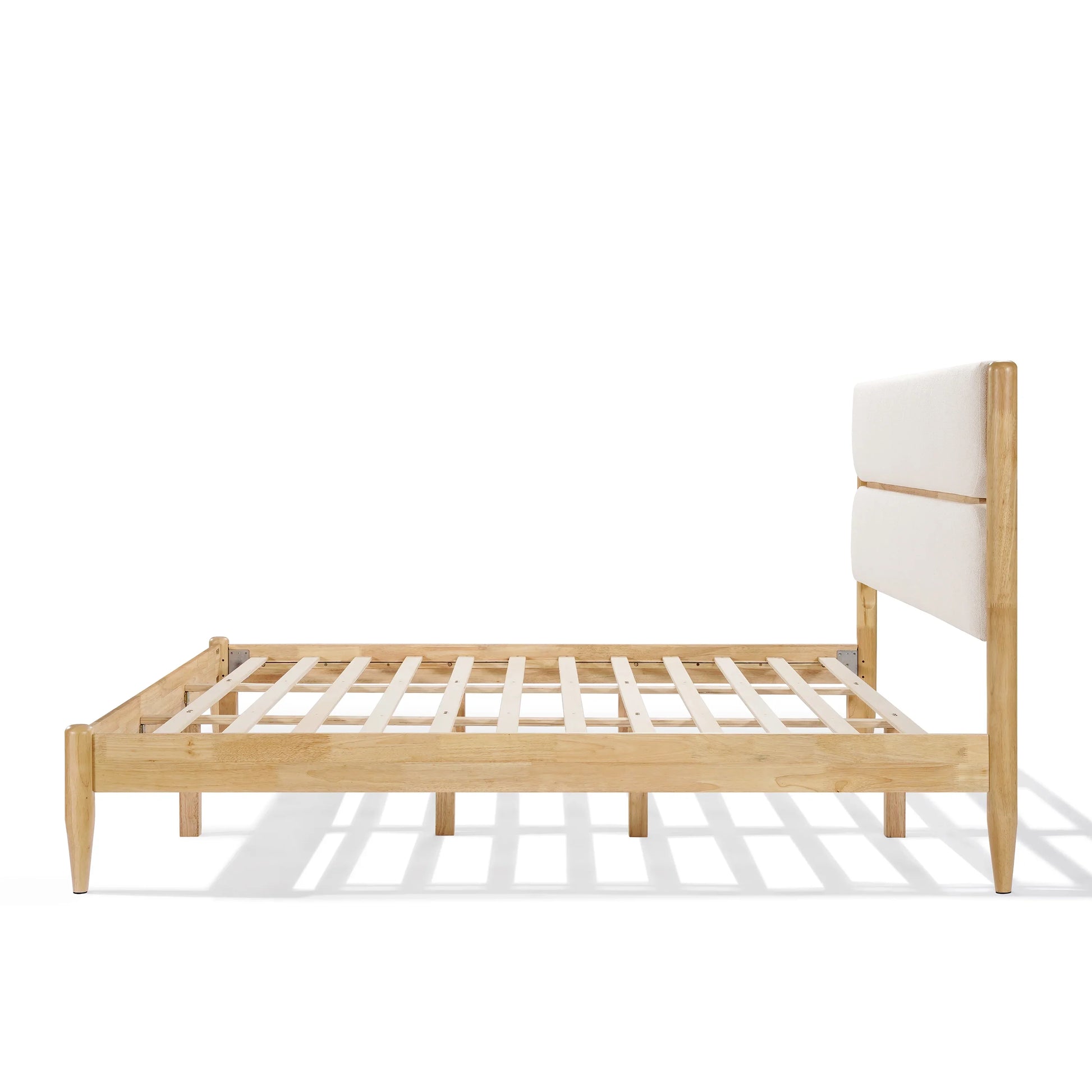 A side profile view of a King Platform Bed showcasing the Durable Rubberwood Frame and reinforced horizontal wood slat system designed for mattress stability without a box spring.