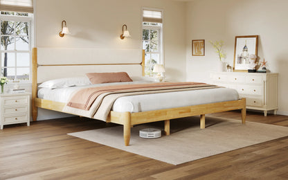 A bright, contemporary bedroom lifestyle scene featuring a King Platform Bed with a split-panel headboard in ivory fleece, surrounded by classic white furniture and warm wood flooring.
