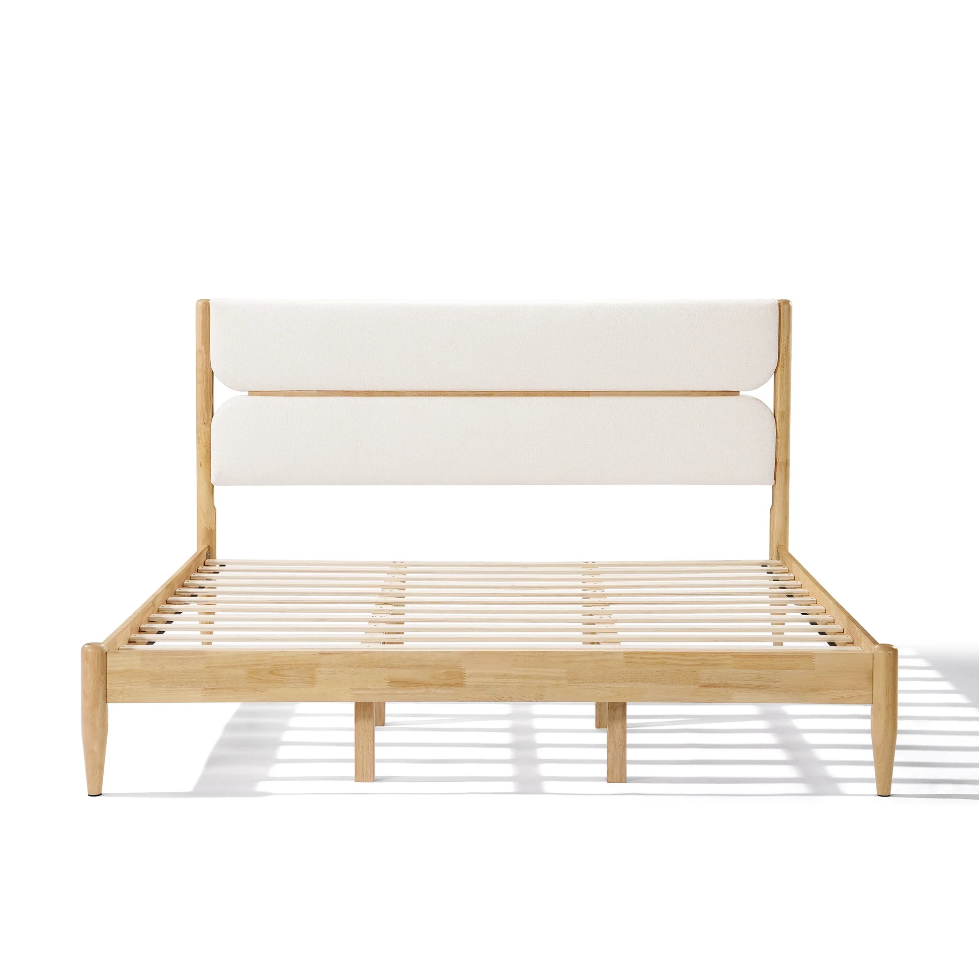 A minimalist King Platform Bed with a Durable Rubberwood Frame and integrated support slats, shown without a mattress to highlight the reinforced architectural design.