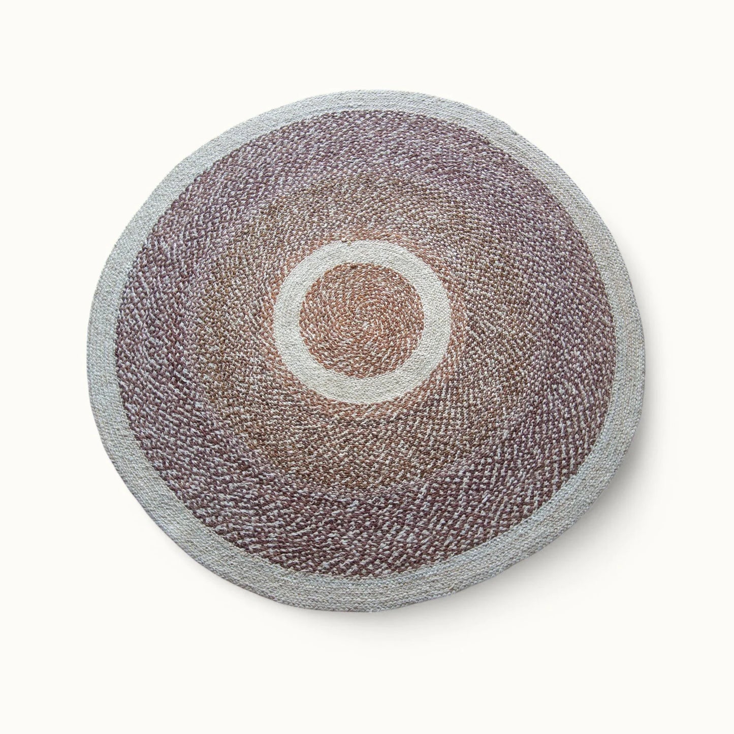 Handwoven round sisal rug red earth variant with warm taupe mauve braided field cream circle ring motif and light grey border on white background