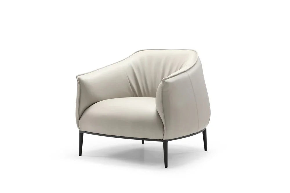 Detailed top view of the light gray lounge seating area showing the soft faux leather texture and thick foam cushioning.