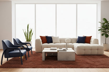 Modern Minimalist Ivory Boucle Sectional Sofa with Chaise Styled in Bright Living Room with Navy Accent Chairs and Rust Rug | Fluent Trends
