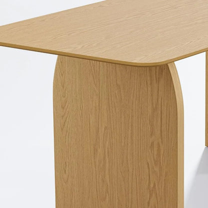 Close up detailed view highlighting the curved wooden panel design and rich grain patterns of a natural oak double pedestal dining table base