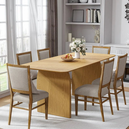 Premium sixty-six inch natural solid oak double pedestal dining table paired with six classic upholstered ladder back chairs in a traditional dining room interior layout
