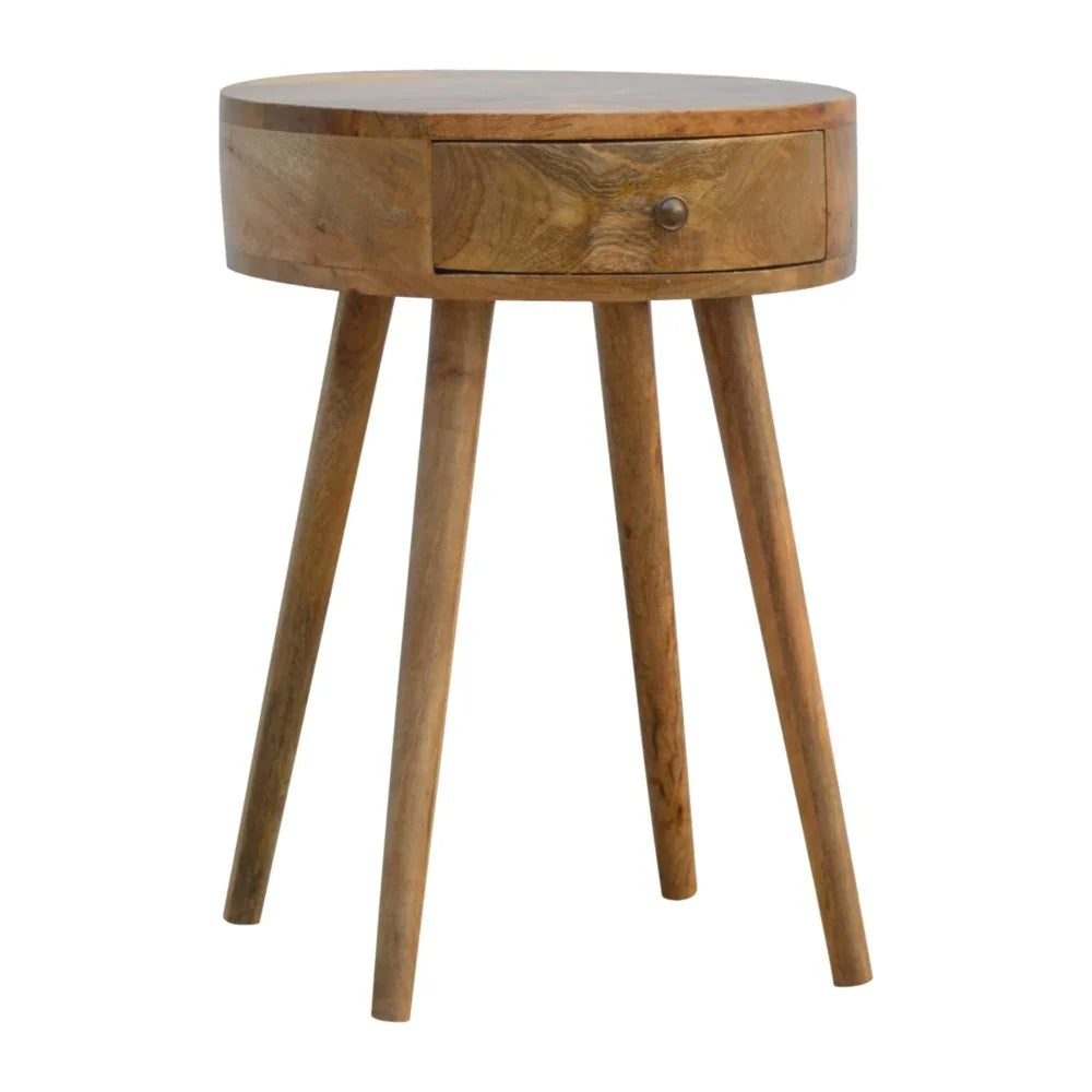 Natural solid wood round nightstand one drawer four splayed legs angled view natural finish white background