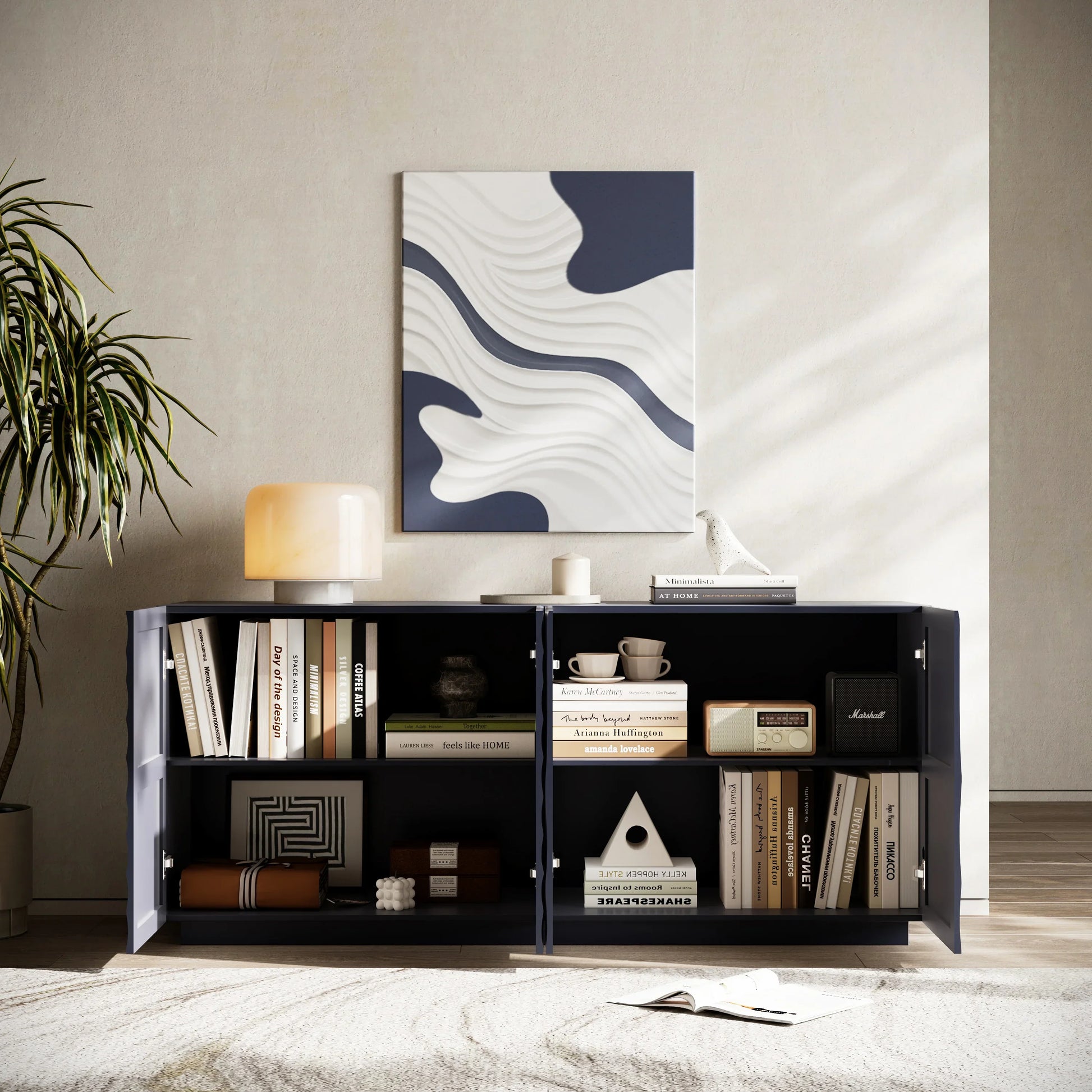 The Navy Blue Buffet Cabinet with doors open, showcasing the spacious internal shelving filled with books and decor to demonstrate high-capacity storage.