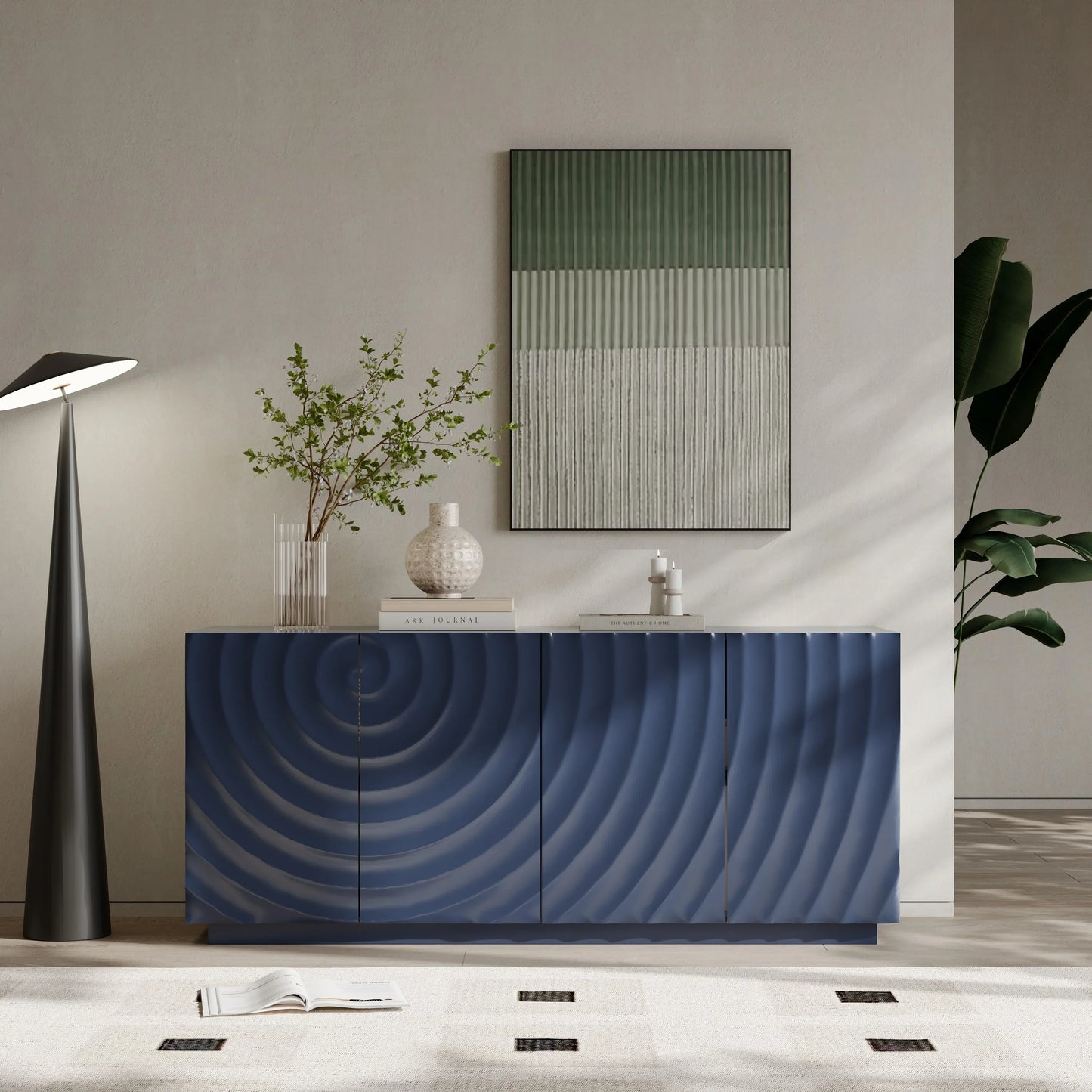 A minimalist lifestyle setting of the Navy Blue Buffet Cabinet featuring the 3D ripple design, paired with a modern floor lamp and a large textured wall art piece.