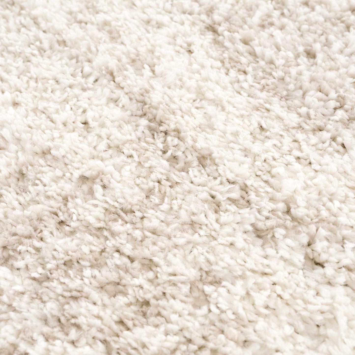 Plush Beige Shag Rug Deep Pile Texture Close-Up Showing Soft Dense Fibers | Fluent Trends