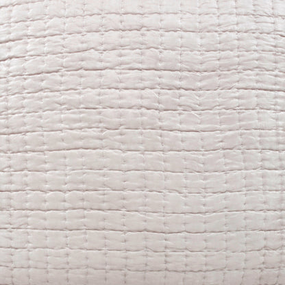 Close-up of the Malibu Oyster silk pillow sham showing its pale warm-neutral tone, softly puckered fabric, and square pick-stitch quilting.
