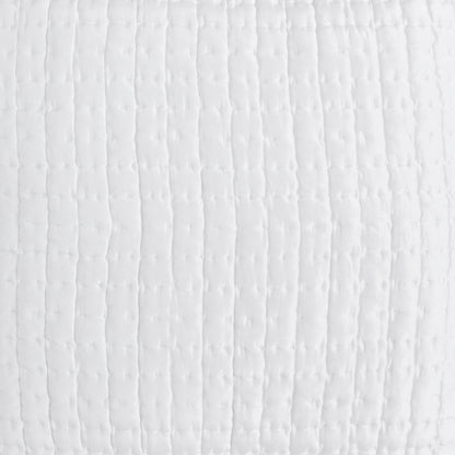 Close-up of the Malibu Pearl silk pillow sham showing soft off-white fabric, fine square pick-stitch quilting, and a gently puckered surface.
