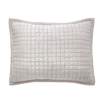 Front view of the Malibu rectangular silk pillow sham in a pale warm-neutral tone, showing square pick-stitch quilting and a smooth fabric border on a white background.