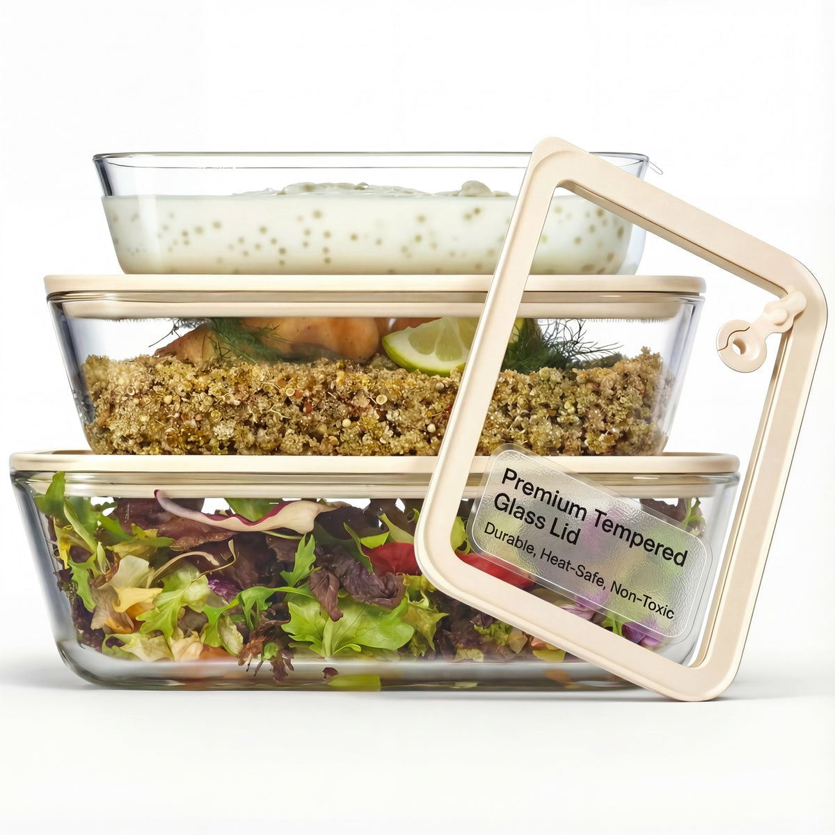 Premium glass food storage set of three stacked rectangular borosilicate containers with tempered glass lids and mixed fresh food on white background