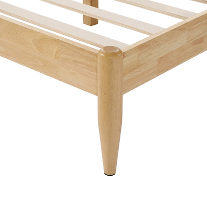 A high-resolution close-up of a rounded, tapered leg on a Durable Rubberwood Frame, showing the precision-crafted corner joint and smooth natural finish for a Queen Platform Bed.