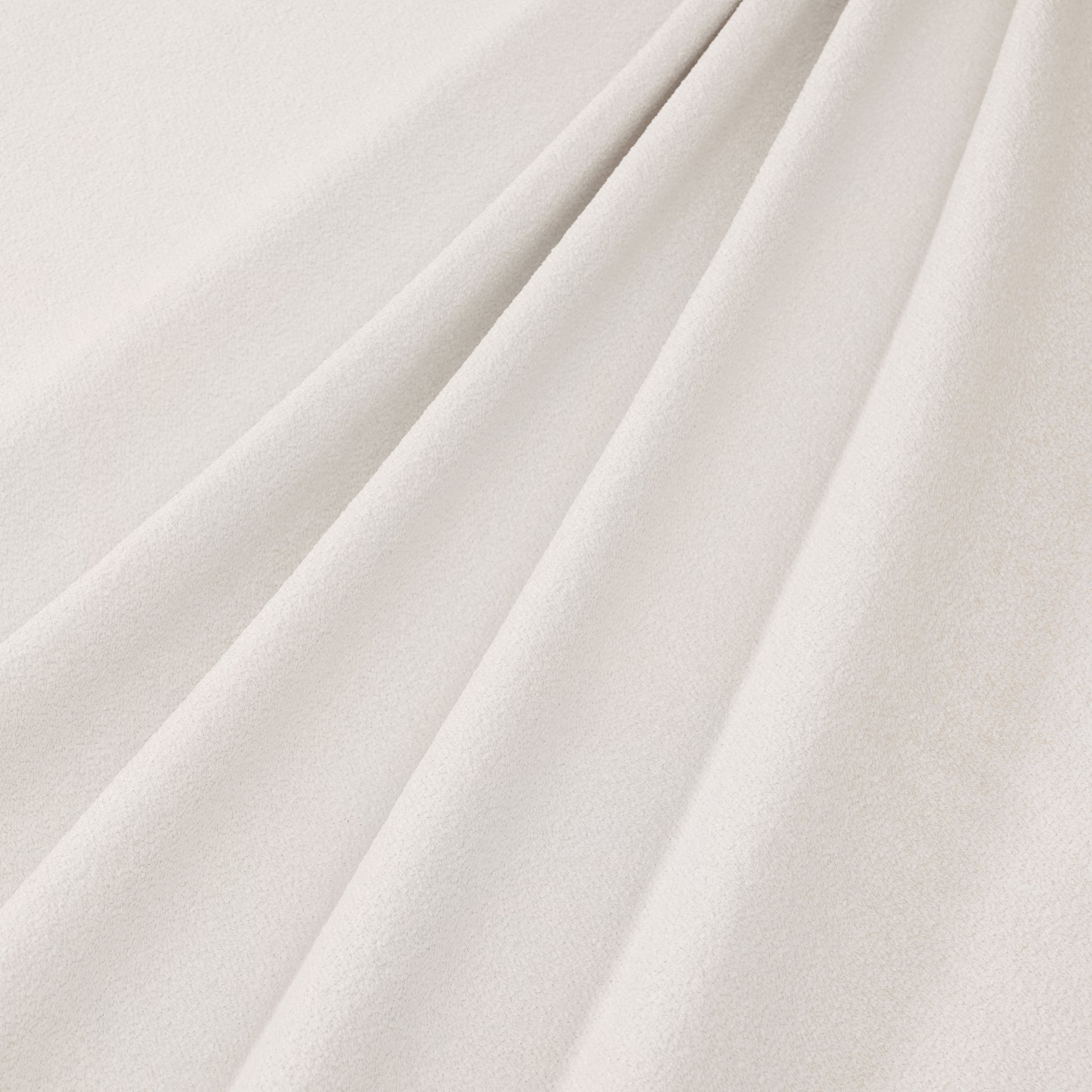 A high-resolution close-up of the Ivory Fleece Furniture upholstery, showcasing the soft, breathable, and textured fabric used on the Queen Platform Bed headboard panels.