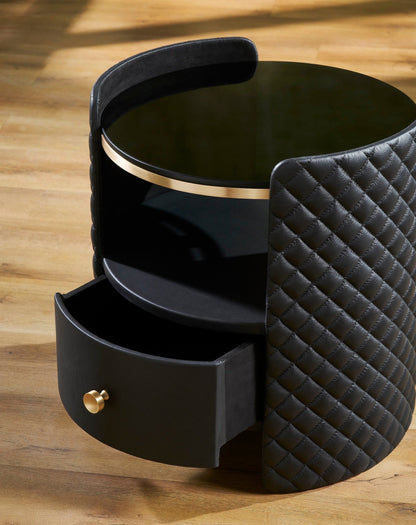 Quilted Round Leather Nightstand black close view open drawer brass pull brass rim shelf detail hardwood