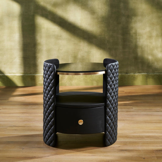 Quilted Round Leather Nightstand black diamond quilting brass rim drawer open hardwood floor styled
