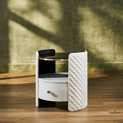 Quilted Round Leather Nightstand white angled view diamond quilting brass rim drawer hardwood floor styled