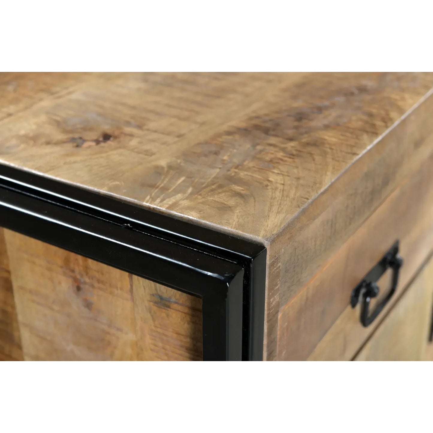 A precise macro view focusing on the corner joinery of the Reclaimed Wood Sideboard, showing where the solid mango wood top integrates into the black industrial iron frame.