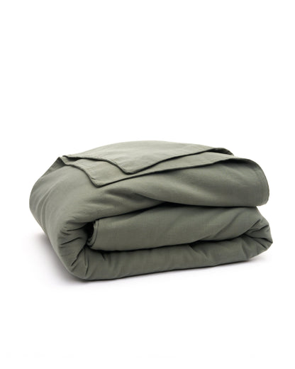 Signature Milk Fibre Deluxe Set Highlands Green duvet cover folded on a white background