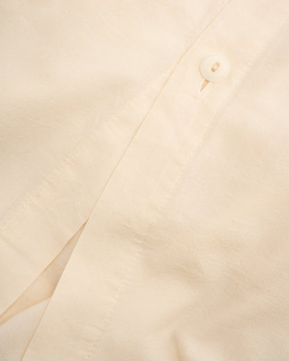 Signature Milk Fibre Duvet Cover Cream hidden button closure and knife-edge finish fabric detail closeup