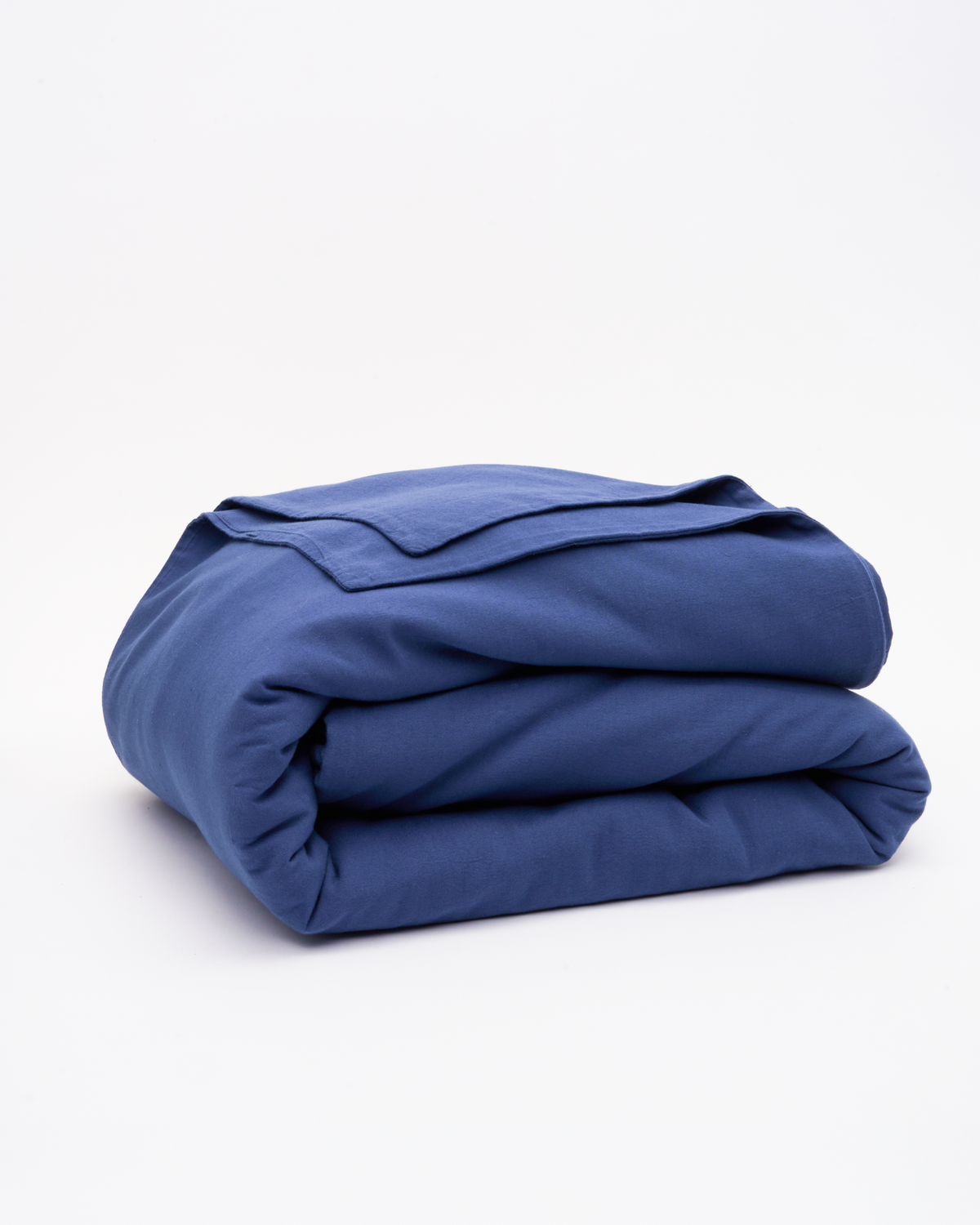 Signature Milk Fibre Duvet Cover Lunar Blue casein cotton duvet cover neatly folded on a white background