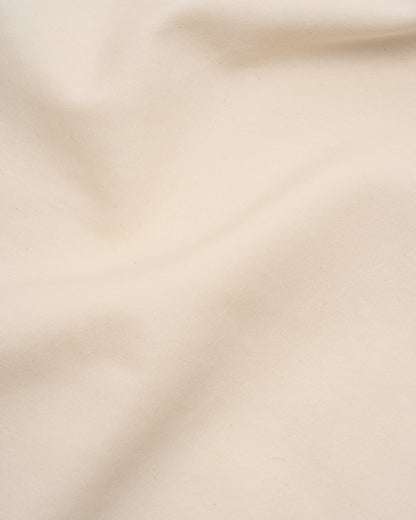 Signature Milk Fibre Sheet Set in Cream fabric texture close up soft drape detail