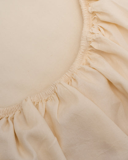 Signature Milk Fibre Sheet Set in Cream fitted sheet corner elastic detail close up
