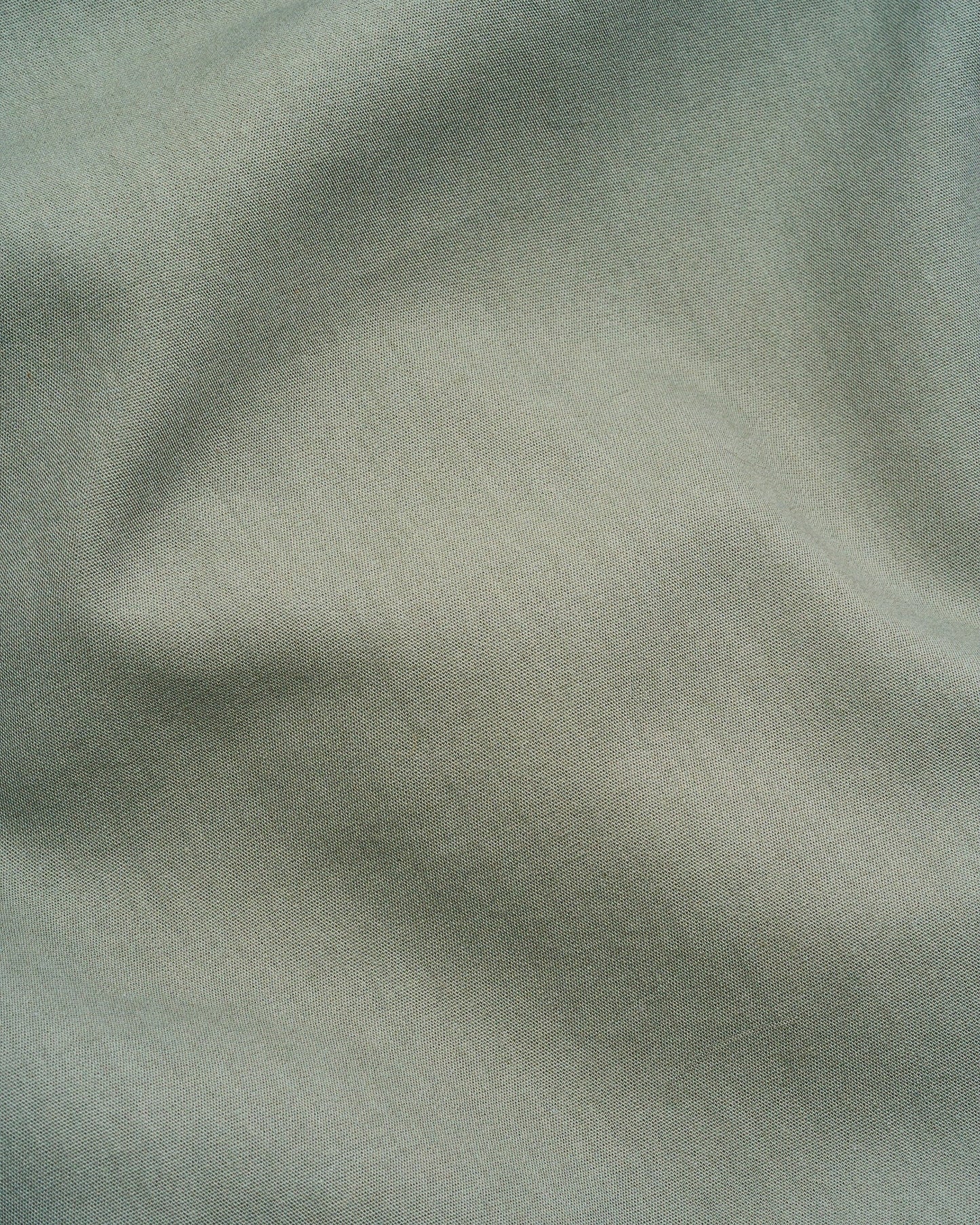 Signature Milk Fibre Sheet Set in Highlands Green fabric texture close up soft weave detail