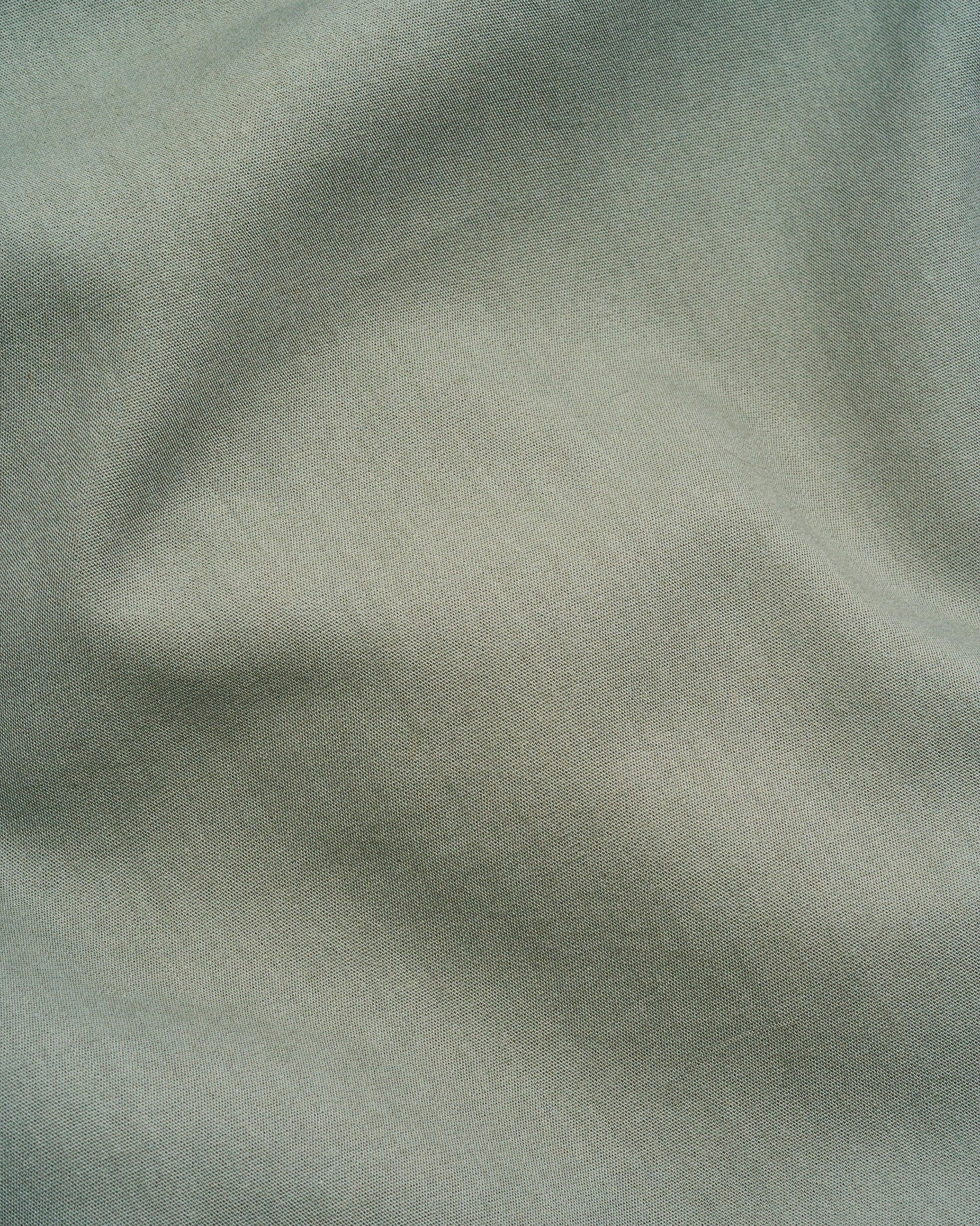 Signature Milk Fibre Sheet Set in Highlands Green fabric texture close up soft weave detail